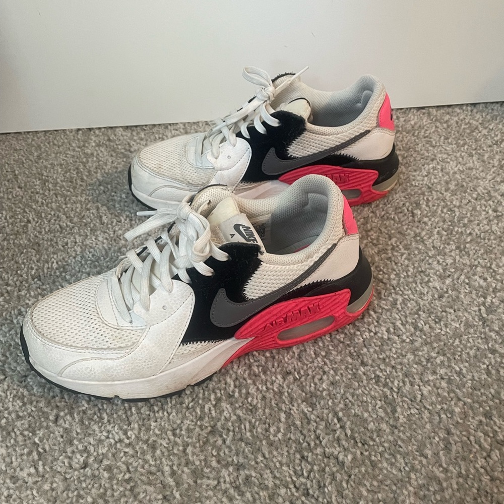 Pink Nike Air tennis shoes